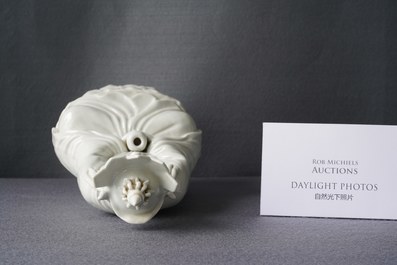 A Chinese blanc de Chine figure of Doumu, seal mark, 19/20th C.