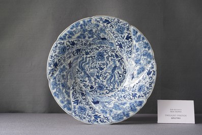 A Chinese blue and white gadrooned dish with phoenixes and monkeys, Kangxi