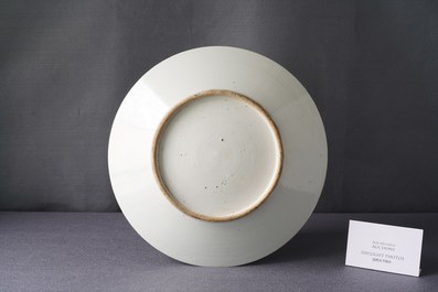 A large Chinese Canton famille rose 'horseriders' dish, 19th C.