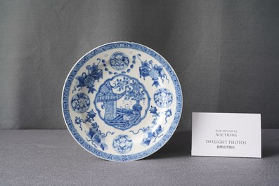 A Chinese blue and white plate with a boy surrounded by antiquities, ex-coll. August the Strong, Kangxi