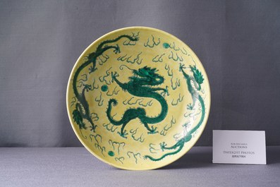 A Chinese yellow-ground famille verte 'dragon' dish, probably Qianlong