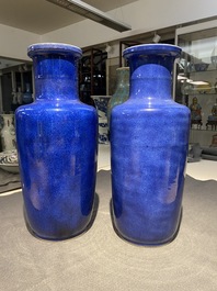 A pair of Chinese monochrome powder blue rouleau vases, Kangxi