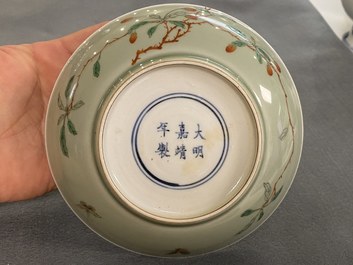 A Chinese famille verte celadon-glazed plate, Wanli mark, Kangxi/Yongzheng