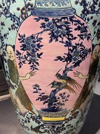 A very large Chinese famille rose turquoise-ground vase and cover, 19th C.