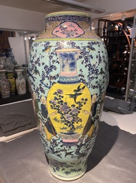 A very large Chinese famille rose turquoise-ground vase and cover, 19th C.
