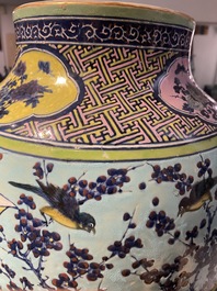 A very large Chinese famille rose turquoise-ground vase and cover, 19th C.