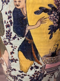 A very large Chinese famille rose turquoise-ground vase and cover, 19th C.
