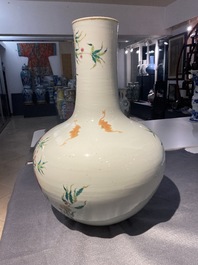 A Chinese famille rose 'tianqiu ping' 'nine peaches' vase, Qianlong mark, 19th C.
