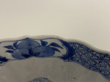 A Chinese blue and white lotus-molded 'Seven sages in the bamboo grove' bowl, Chenghua mark, Kangxi