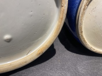 A pair of Chinese monochrome powder blue rouleau vases, Kangxi