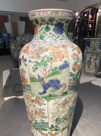 A pair of Chinese famille verte 'mythical animals' vases, Kangxi