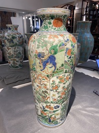 A pair of Chinese famille verte 'mythical animals' vases, Kangxi