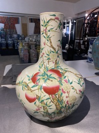 A Chinese famille rose 'tianqiu ping' 'nine peaches' vase, Qianlong mark, 19th C.