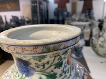 A pair of Chinese famille verte 'mythical animals' vases, Kangxi