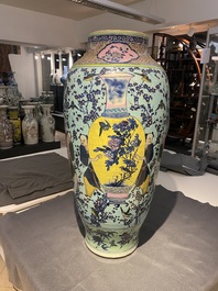 A very large Chinese famille rose turquoise-ground vase and cover, 19th C.