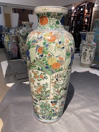 A pair of Chinese famille verte 'mythical animals' vases, Kangxi
