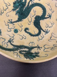 A Chinese yellow-ground famille verte 'dragon' dish, probably Qianlong