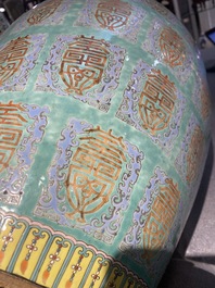 A fine Chinese turquoise-ground famille rose 'Shou' vase with immortals, Qianlong
