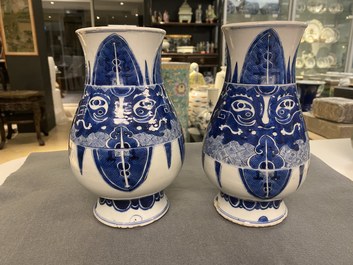 A pair of Chinese blue and white 'taotie' vases, Kangxi