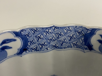 A Chinese blue and white lotus-molded 'Seven sages in the bamboo grove' bowl, Chenghua mark, Kangxi