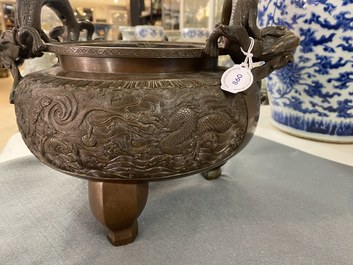 A large Chinese dragon-handled bronze tripod censer and cover, Xuande mark, 18/19th C.