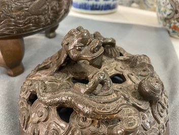 A large Chinese dragon-handled bronze tripod censer and cover, Xuande mark, 18/19th C.