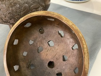 A large Chinese dragon-handled bronze tripod censer and cover, Xuande mark, 18/19th C.