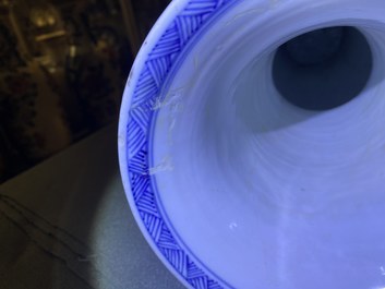 Een Chinese blauw-witte 'yenyen' vaas met landschappen en florale panelen, Kangxi