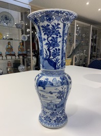 Een Chinese blauw-witte 'yenyen' vaas met landschappen en florale panelen, Kangxi