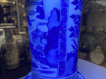 Een Chinese blauw-witte 'yenyen' vaas met landschappen en florale panelen, Kangxi
