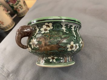 A Chinese verte biscuit 'flaming horses' censer, Jiajing mark, 18/19th C.