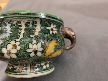 A Chinese verte biscuit 'flaming horses' censer, Jiajing mark, 18/19th C.