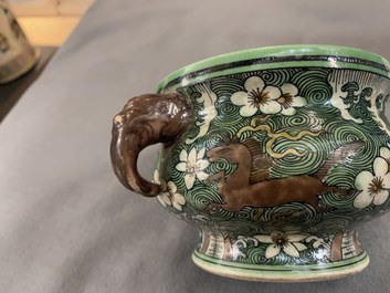 A Chinese verte biscuit 'flaming horses' censer, Jiajing mark, 18/19th C.