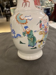 A Chinese famille rose 'horseriders' vase, Yongzheng