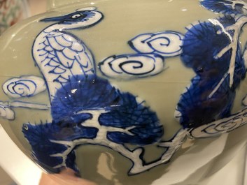 A Chinese blue, white and copper-red celadon-ground 'birds and deer' vase, Kangxi