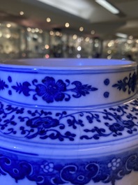 A Chinese blue and white soft paste 'sanduo' 'lantern' vase, Qianlong