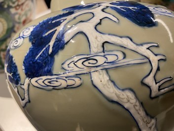 A Chinese blue, white and copper-red celadon-ground 'birds and deer' vase, Kangxi