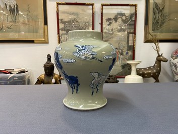 A Chinese blue, white and copper-red celadon-ground 'birds and deer' vase, Kangxi