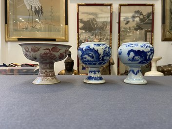 A pair of Chinese blue and white 'dragon' stem cups and one in copper-red, 19/20th C.