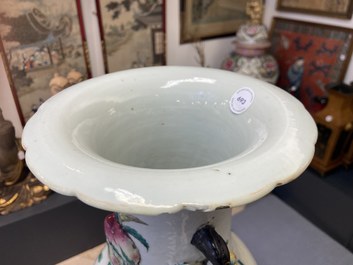 A Chinese famille rose molded 'nine peaches' vase, 19th C.