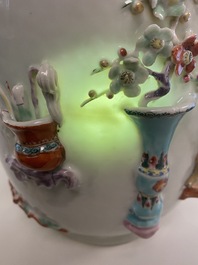A Chinese famille rose vase with applied 'antiquities' design, Yongzheng
