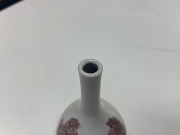 A small Chinese copper-red bottle vase with Buddhist lions, Kangxi