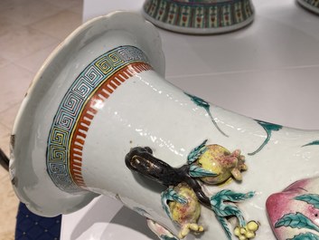 A Chinese famille rose molded 'nine peaches' vase, 19th C.