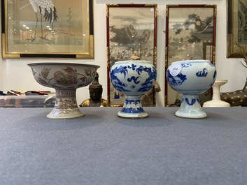 A pair of Chinese blue and white 'dragon' stem cups and one in copper-red, 19/20th C.