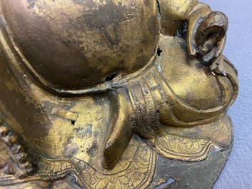 Une figure de Bouddha assis en bronze dor&eacute;, Chine, Ming