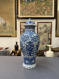 A Chinese blue and white vase and cover with floral design, Kangxi