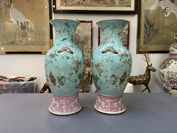 A pair of Chinese famille rose turquoise-ground vases with butterfly handles, 19th C.