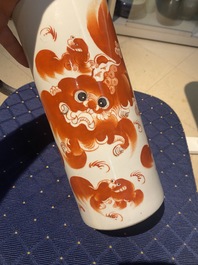 A Chinese famille rose 'playing boys' vase, a pair of hat stands and a head rest with Buddhist lions, 19/20th C.