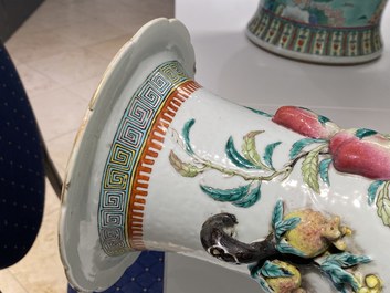 A Chinese famille rose molded 'nine peaches' vase, 19th C.