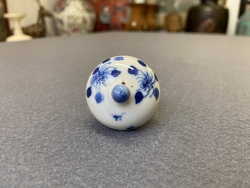 Four Chinese Yixing stoneware, blue and white and monochrome black porcelain teapots, Kangxi and later